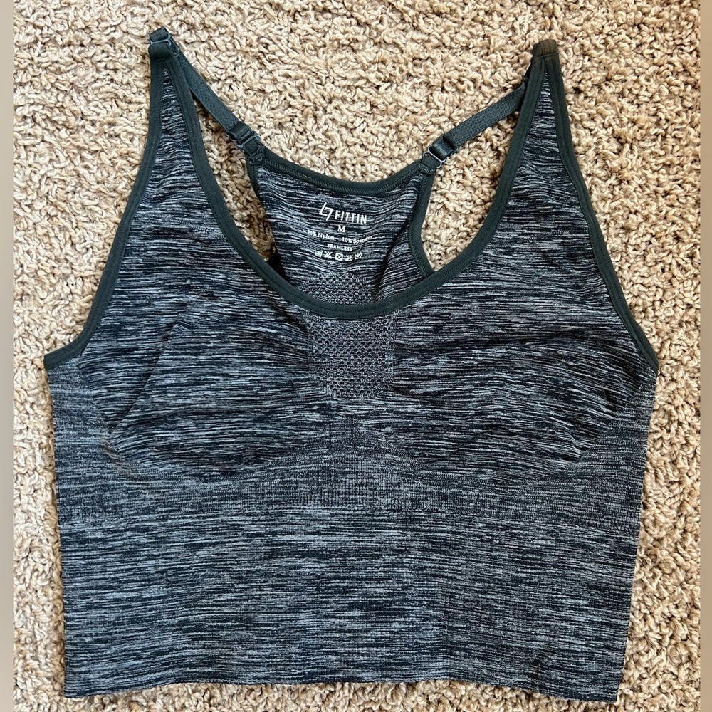 Crop top style sports bra. Size M but runs small. Will fit XS-S. Grey space dye